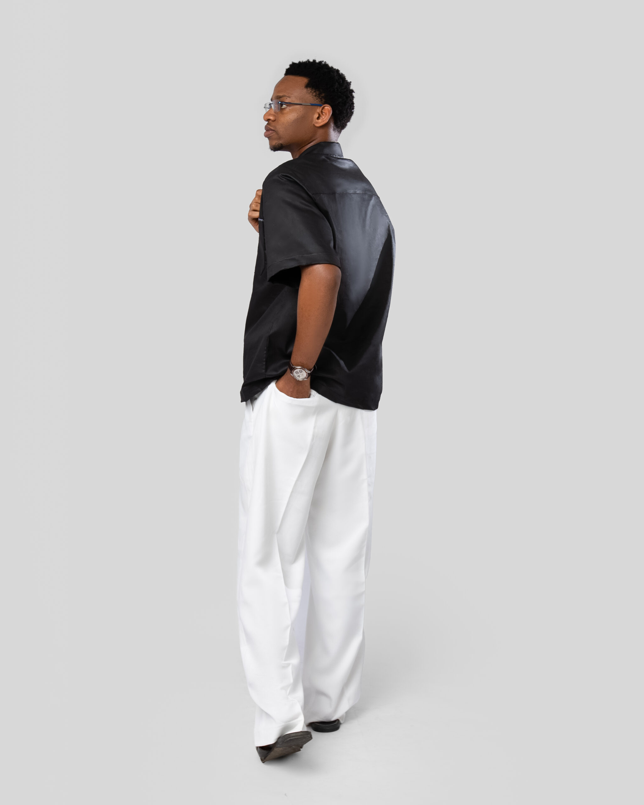 Off-white Pants paired with Black or White Subtle Embroidered Button-down Shirt - Image 3